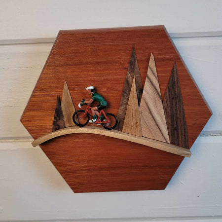 Wooden frame less 3d plaque of cyclist in the mountains