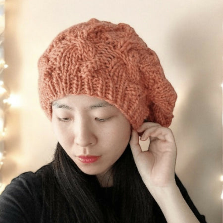 Cable Hand Knit Slouchy Beanie in peach orange