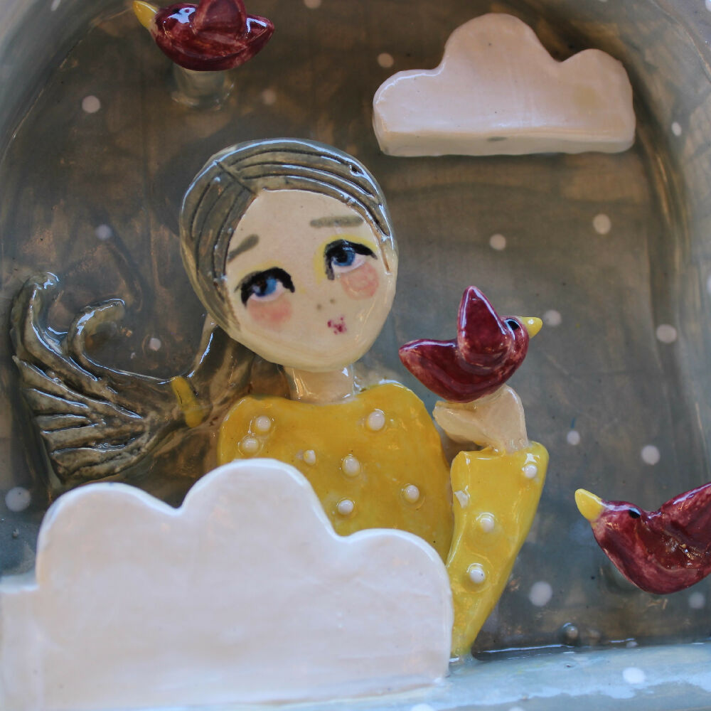 diorama in clay, grey, girl, birds pottery