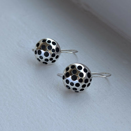 handmade round domed holey earrings