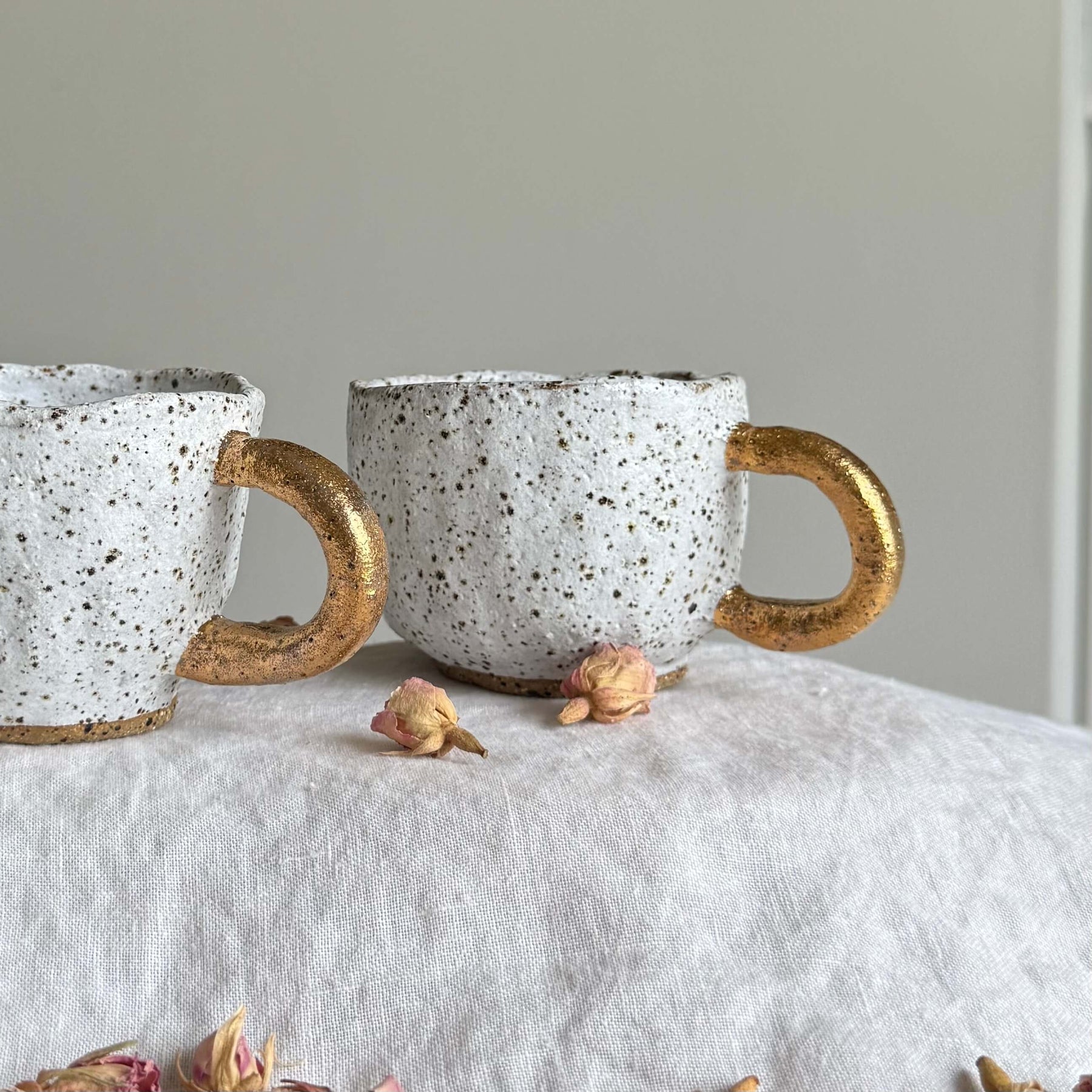 Handmade Ceramic Pinch Pot Cup | White Speckled Mug with Gold Handle | 200ml