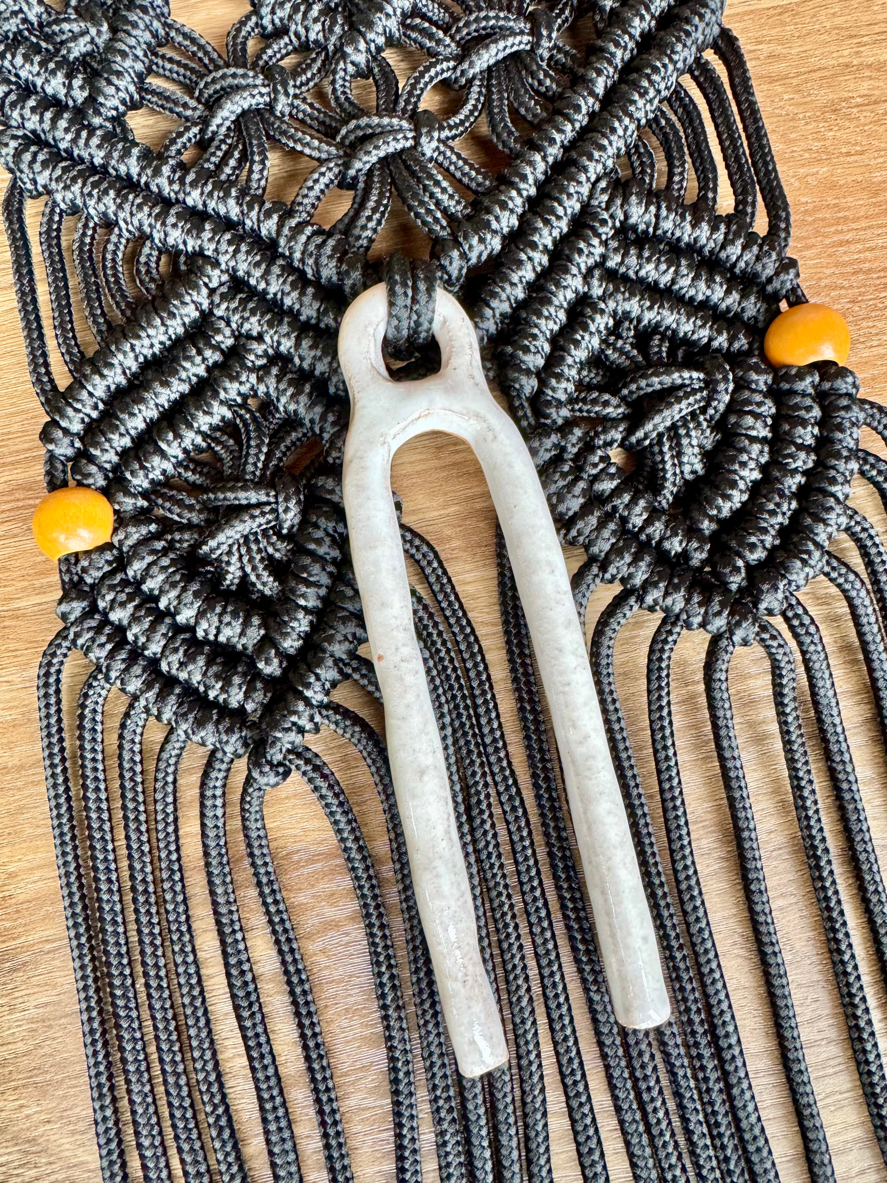 Black macrame wall hanging