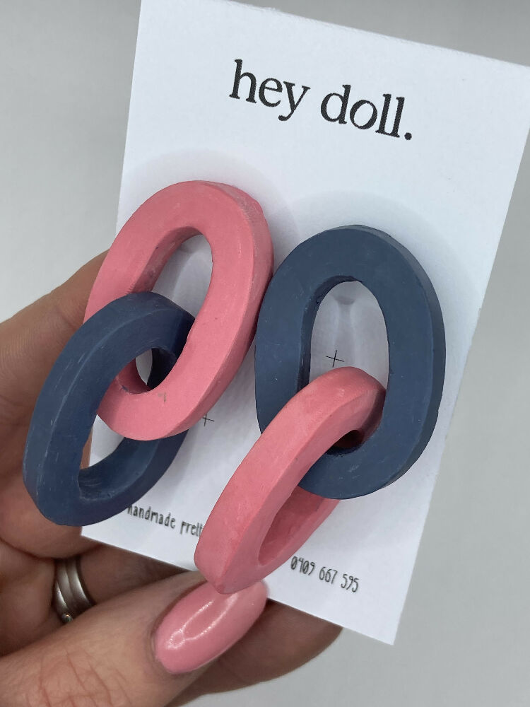 Links pink and blue dangle stud earrings