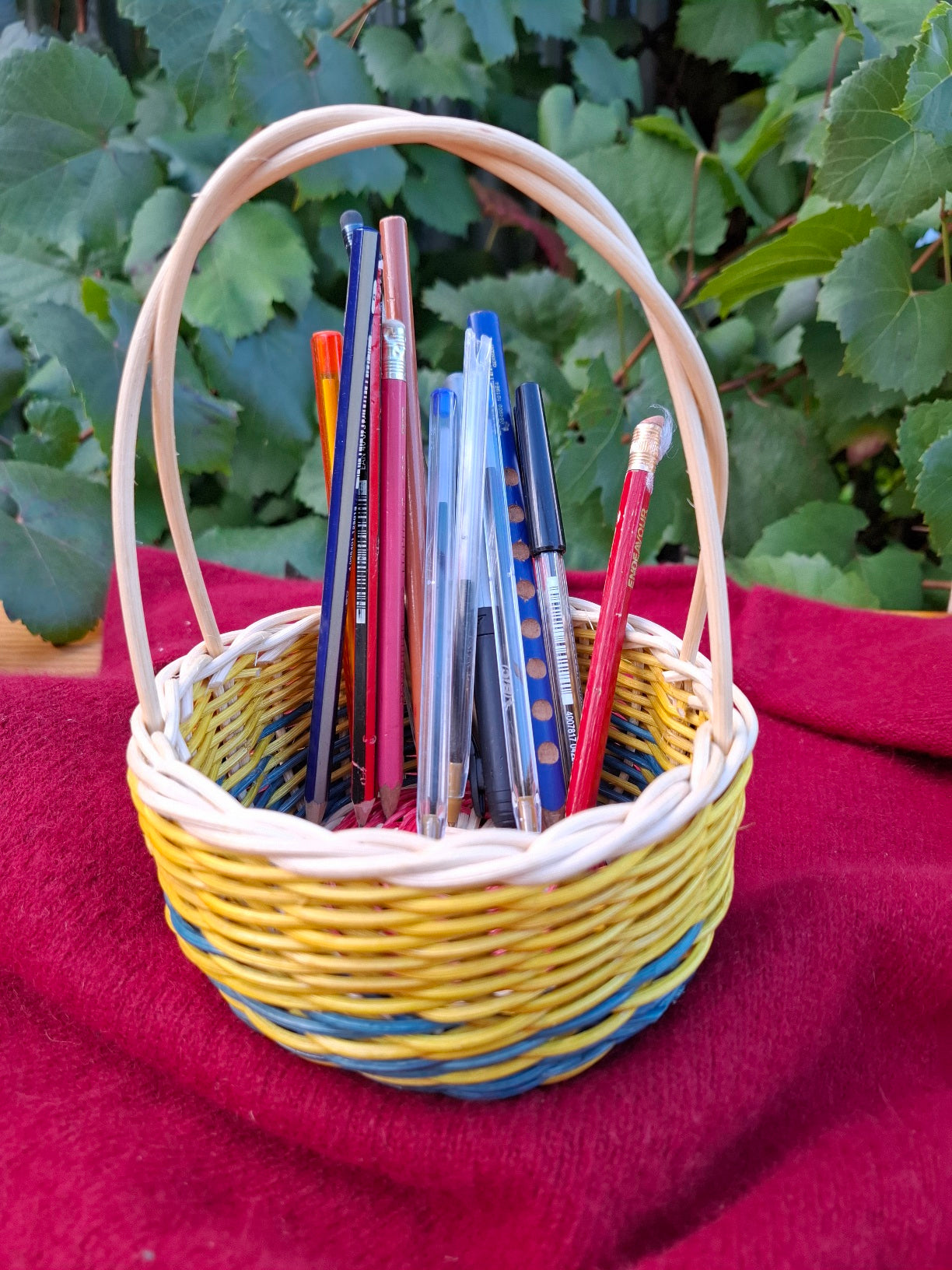 Small blue yellow handled basket