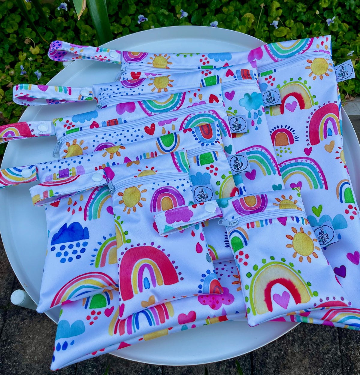 PRE-ORDER Water-resistant wet bags - Rainbows of Hope in the Sky Multicolour Nursery (Ninola Design)