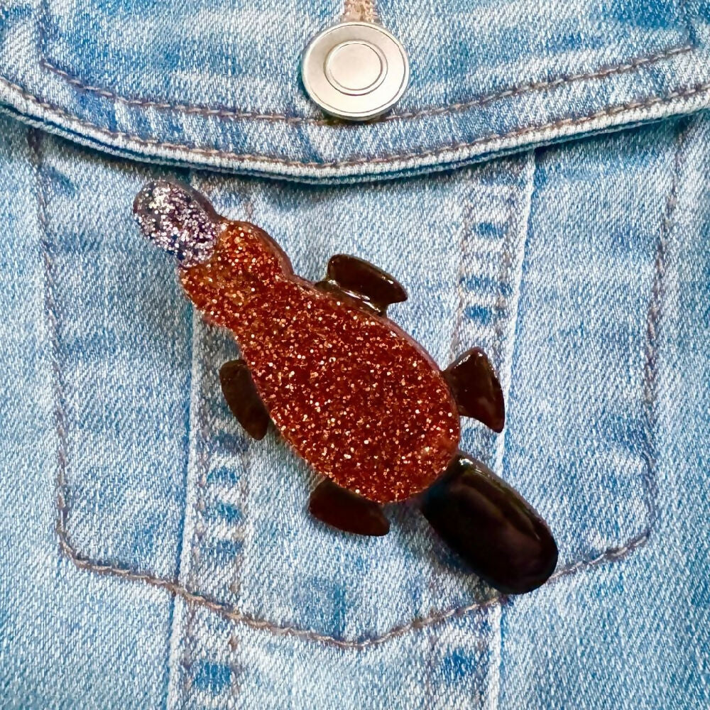 Australian-handmade-platypus-brooch-wood-glitter-resin-on-jacket-light