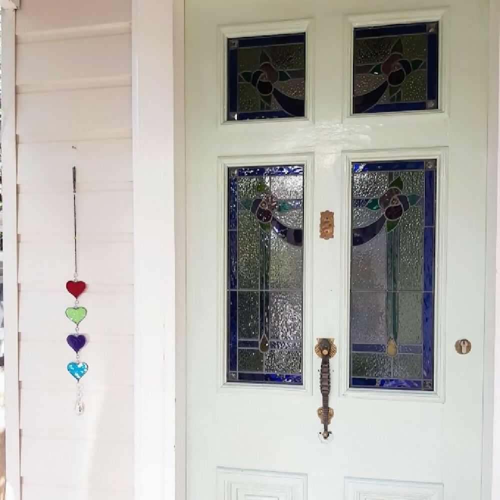 Stained glass hanging hearts with rainbow making crystal