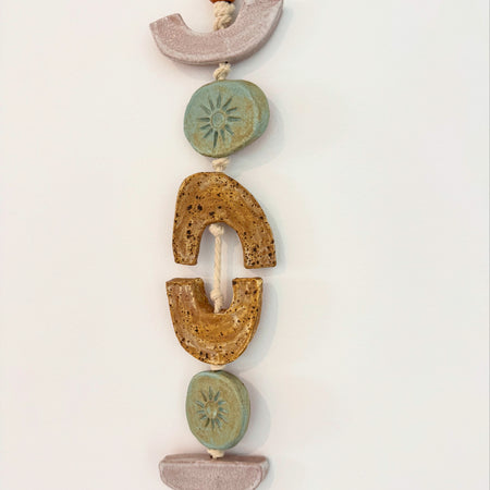 Clay wall hanging