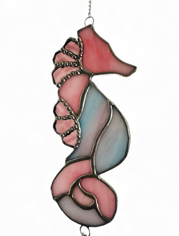 Stained glass seahorse in shades of pink
