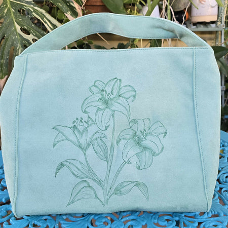 Turquoise faux suede Lily flower pyrography bag