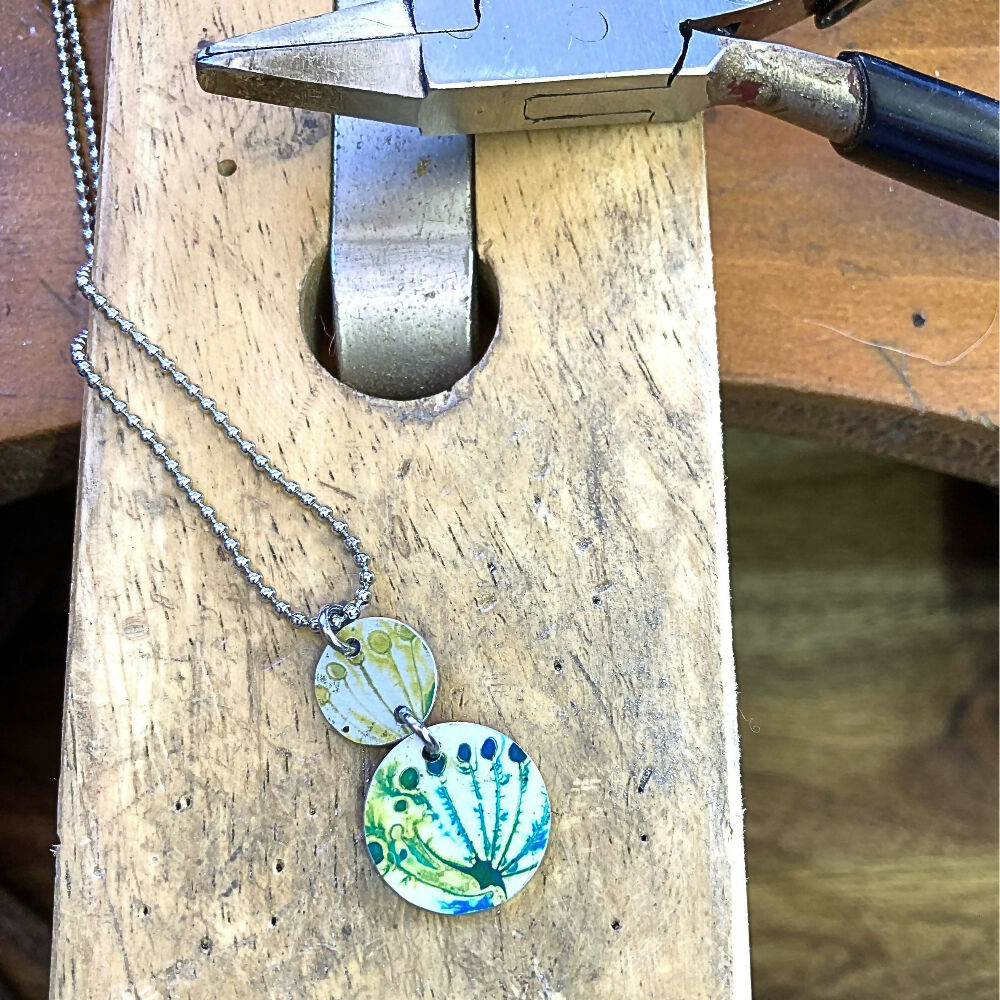 Printed anodised aluminium green floral pendant