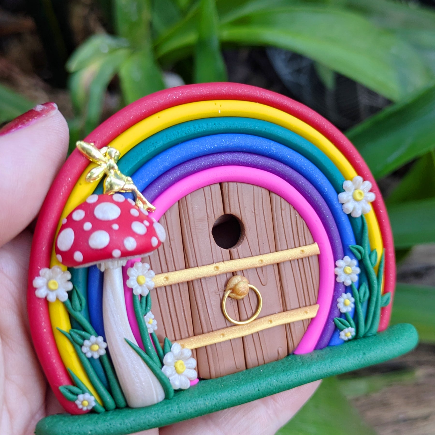 Mini Rainbow Fairy Door with Golden Fairy on Red Mushroom