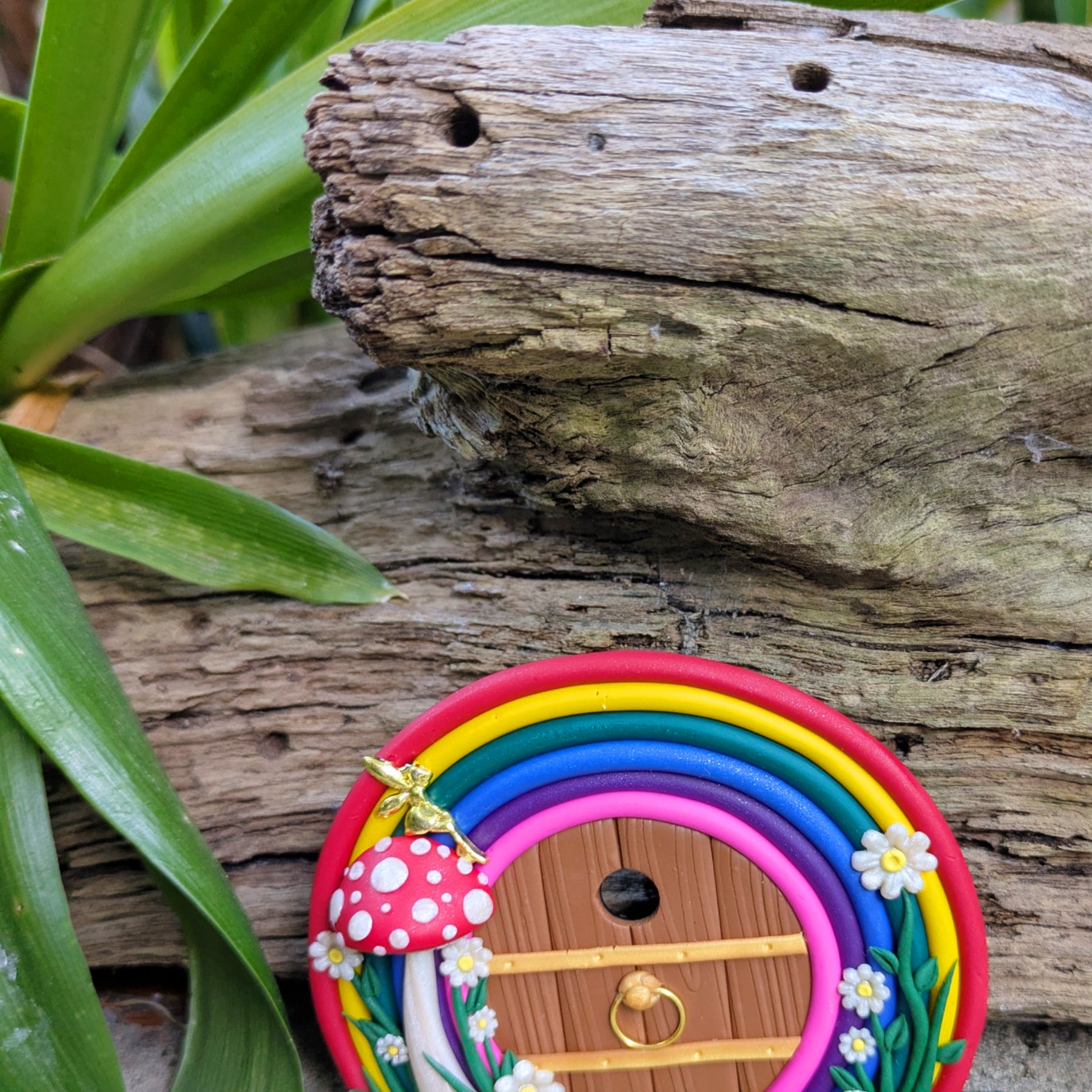 Mini Rainbow Fairy Door with Golden Fairy on Red Mushroom
