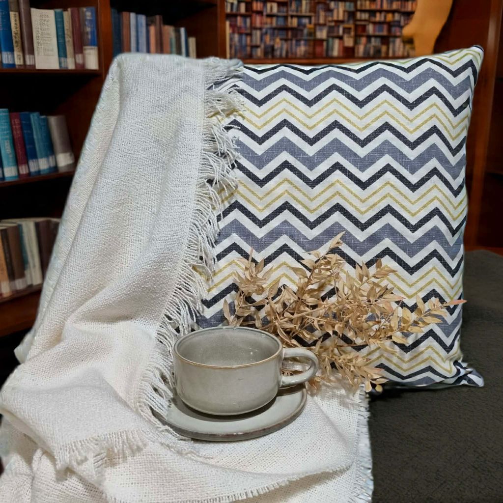 Geometric grey and yellow cushion cover. Modern living
