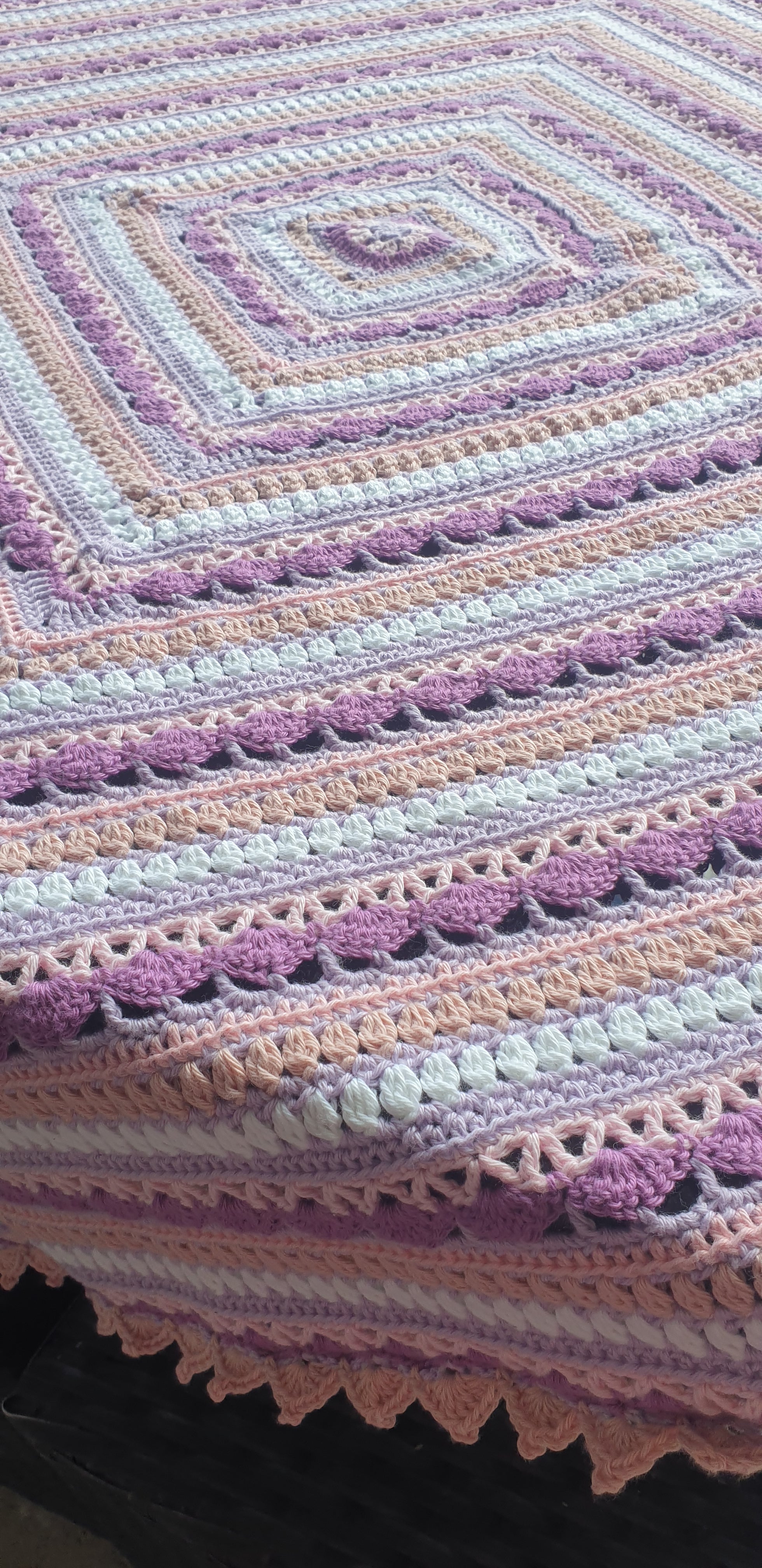 Beautiful crochet cotton afghan in pink/lilacs