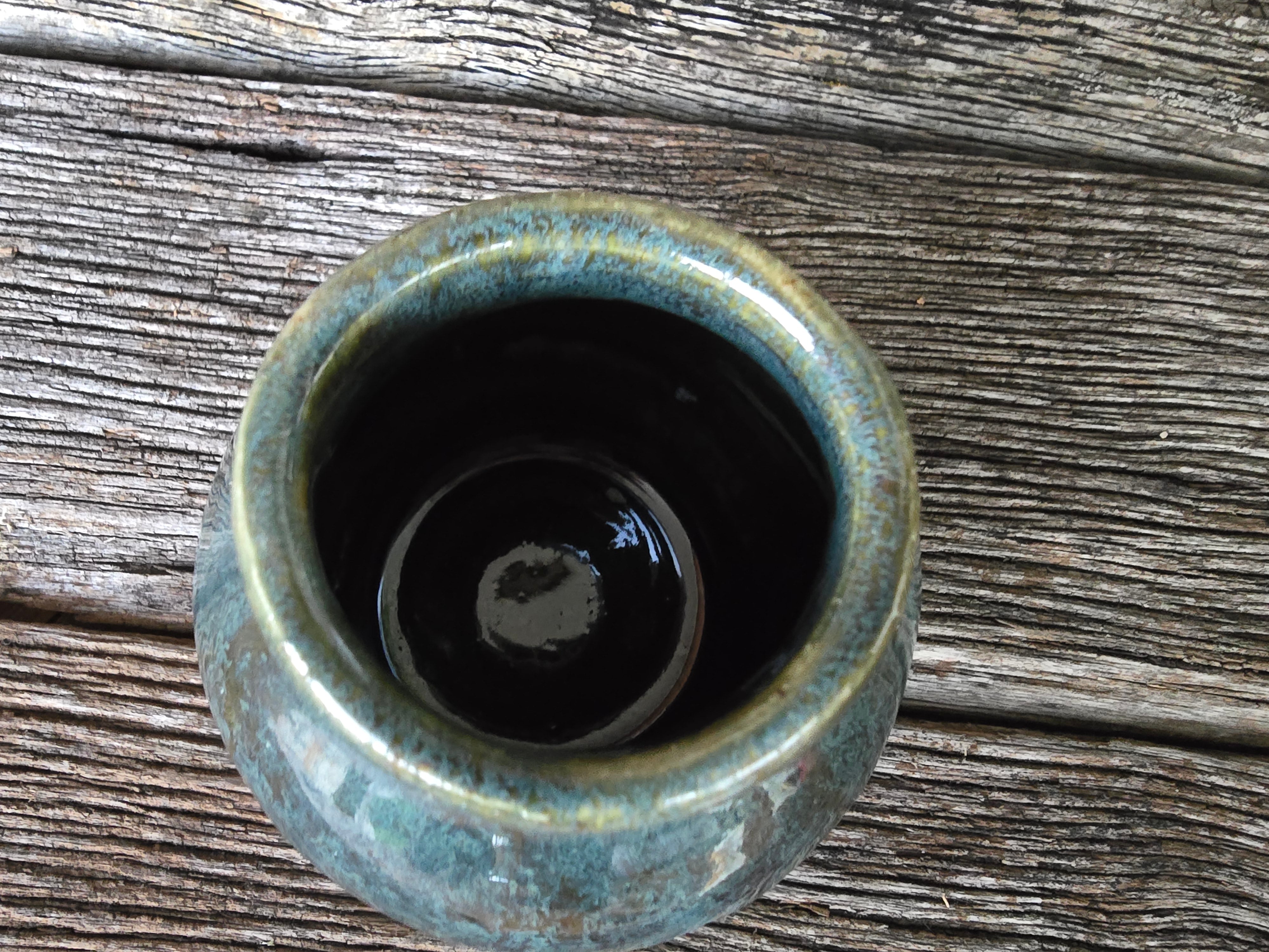 Drippy green vase