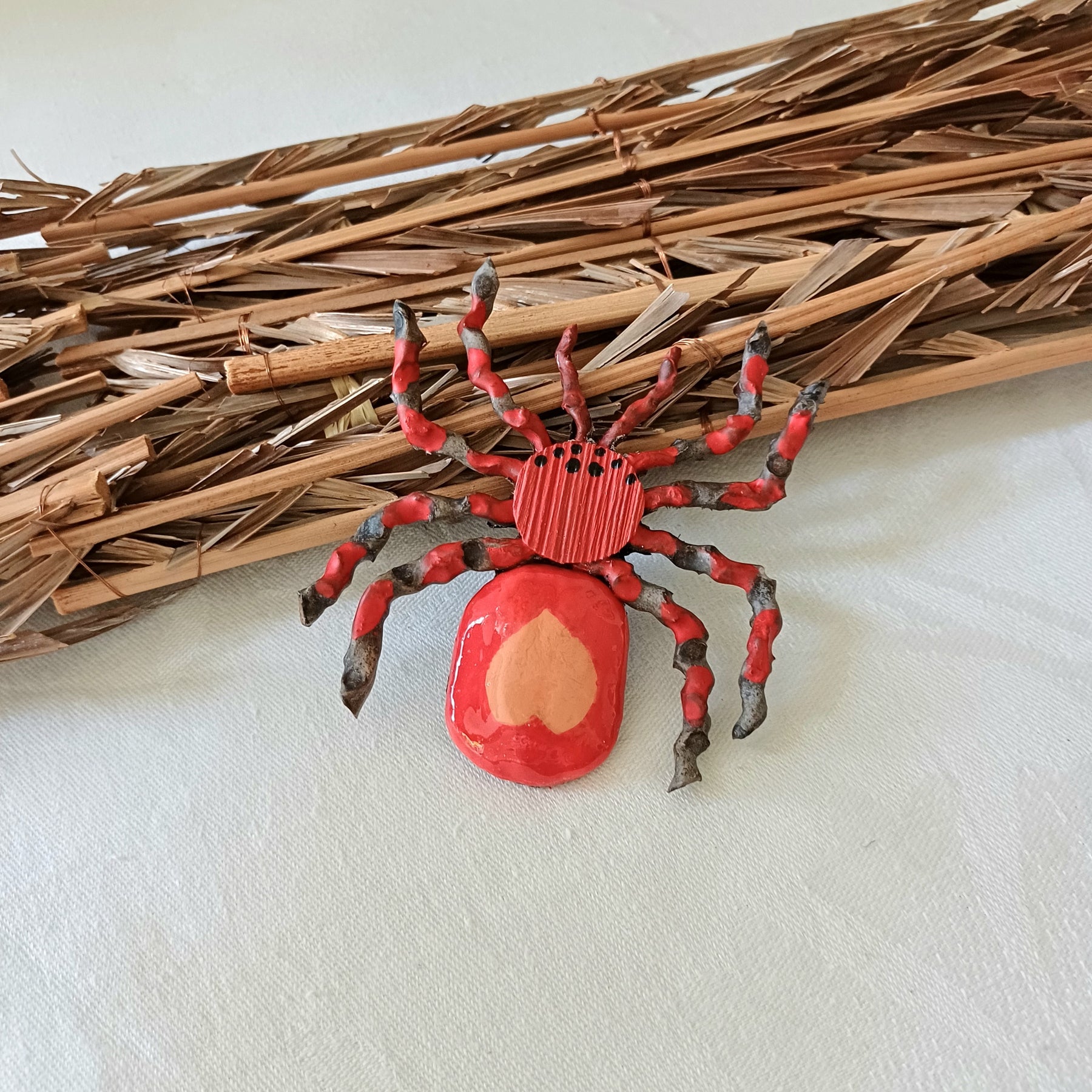 Hand painted red palm clay spider keepsake
