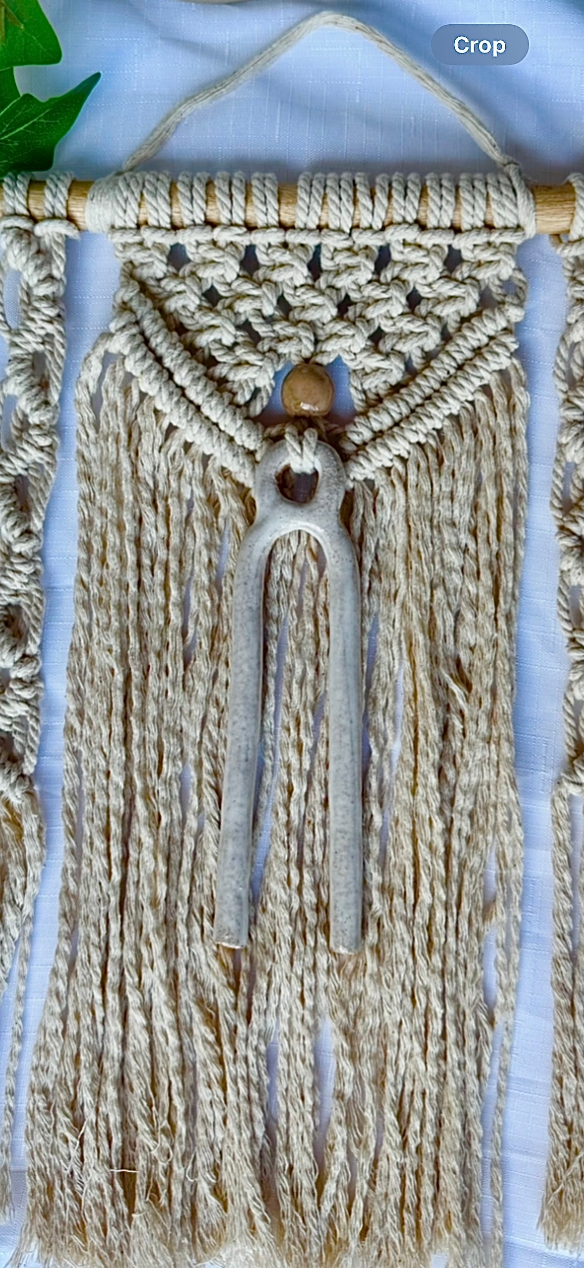 Macrame wall hanging with clay centerpiece & bead