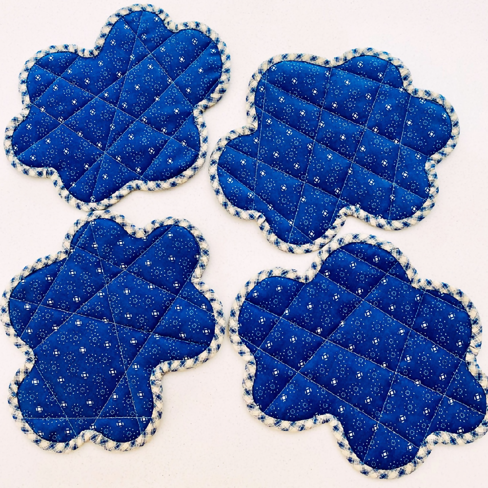 Set of 4 blue cloud shaped crazy patchwork mug rugs