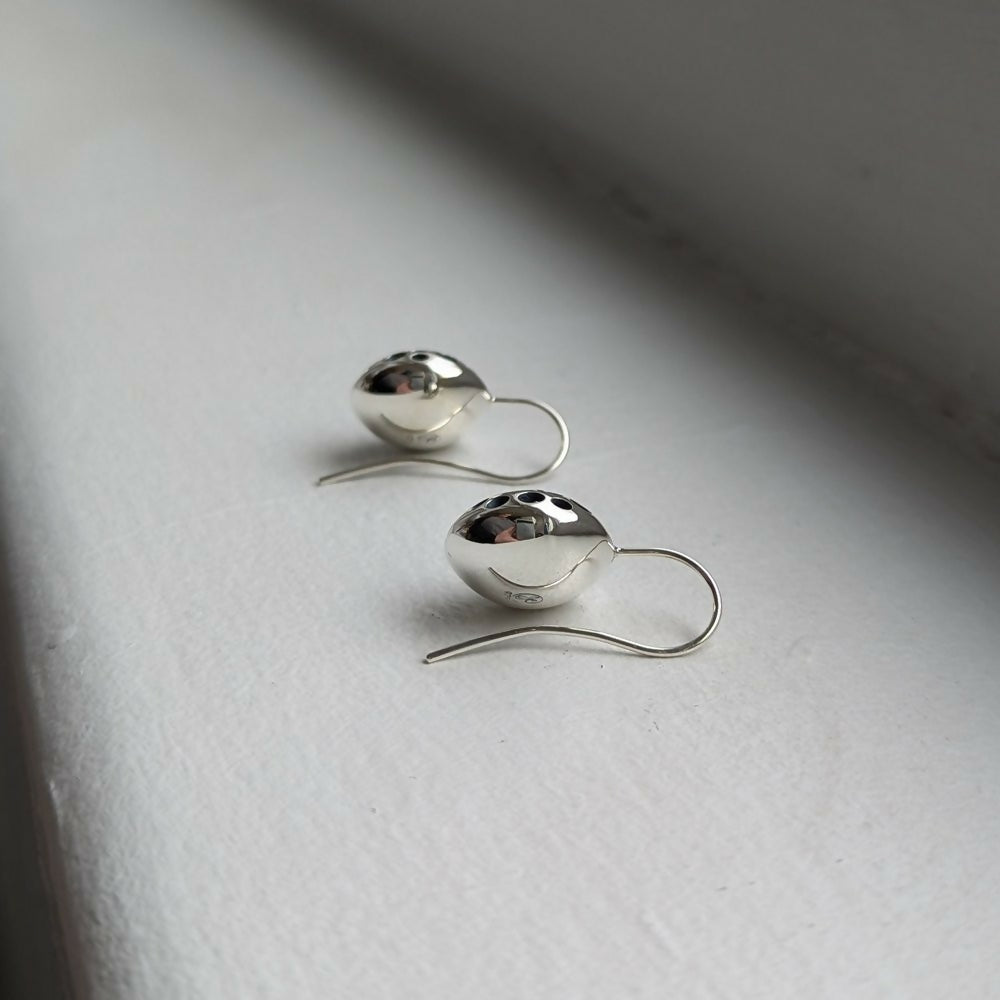 round domed holey earrings