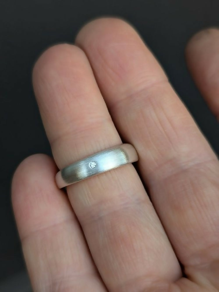 handmade offset ring × with diamond