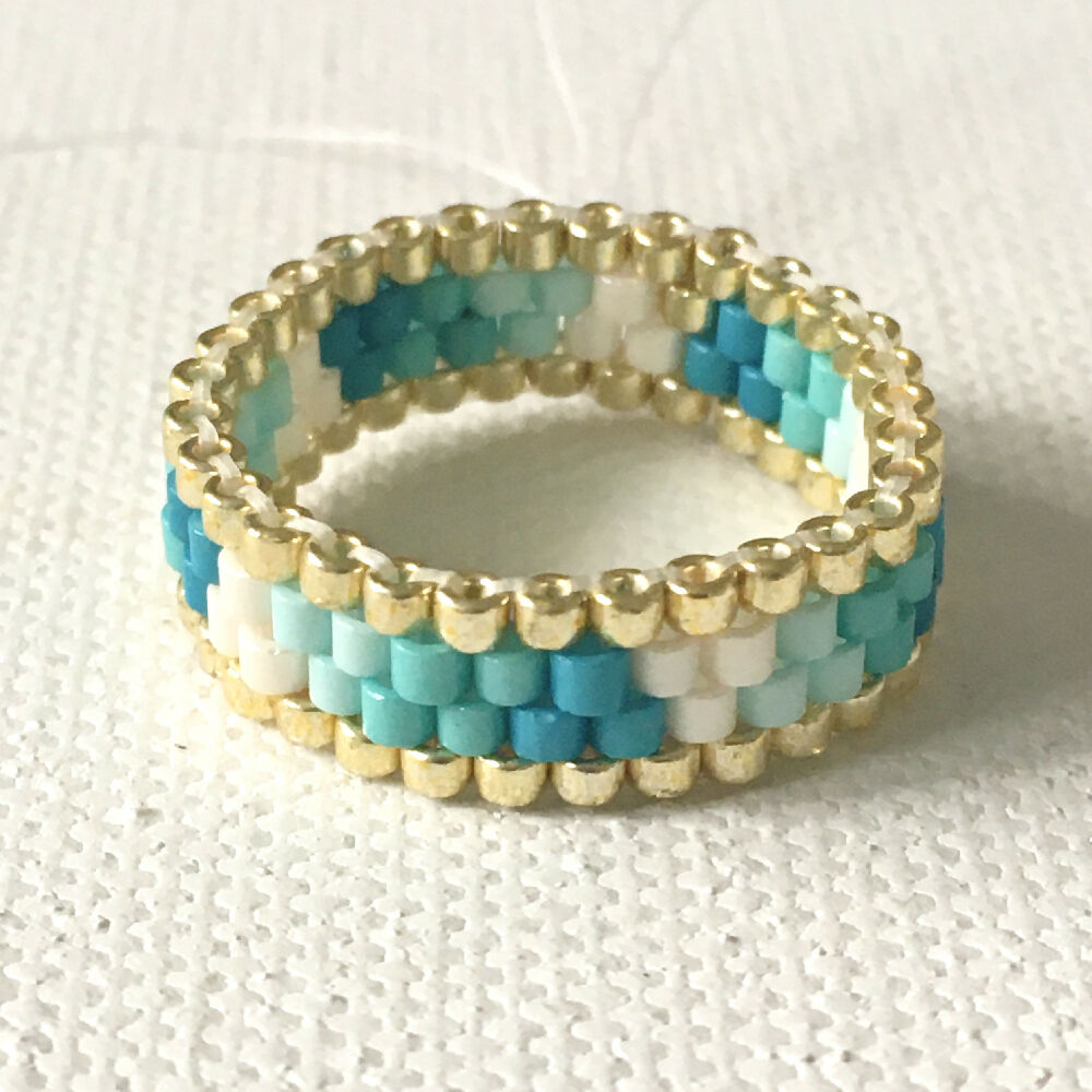 Blue, turquoise, white and gold beaded peyote ring