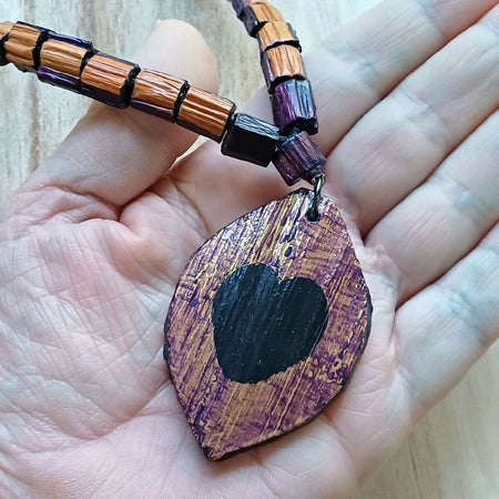 Hand painted Heart pendant on palm leaf bead necklace