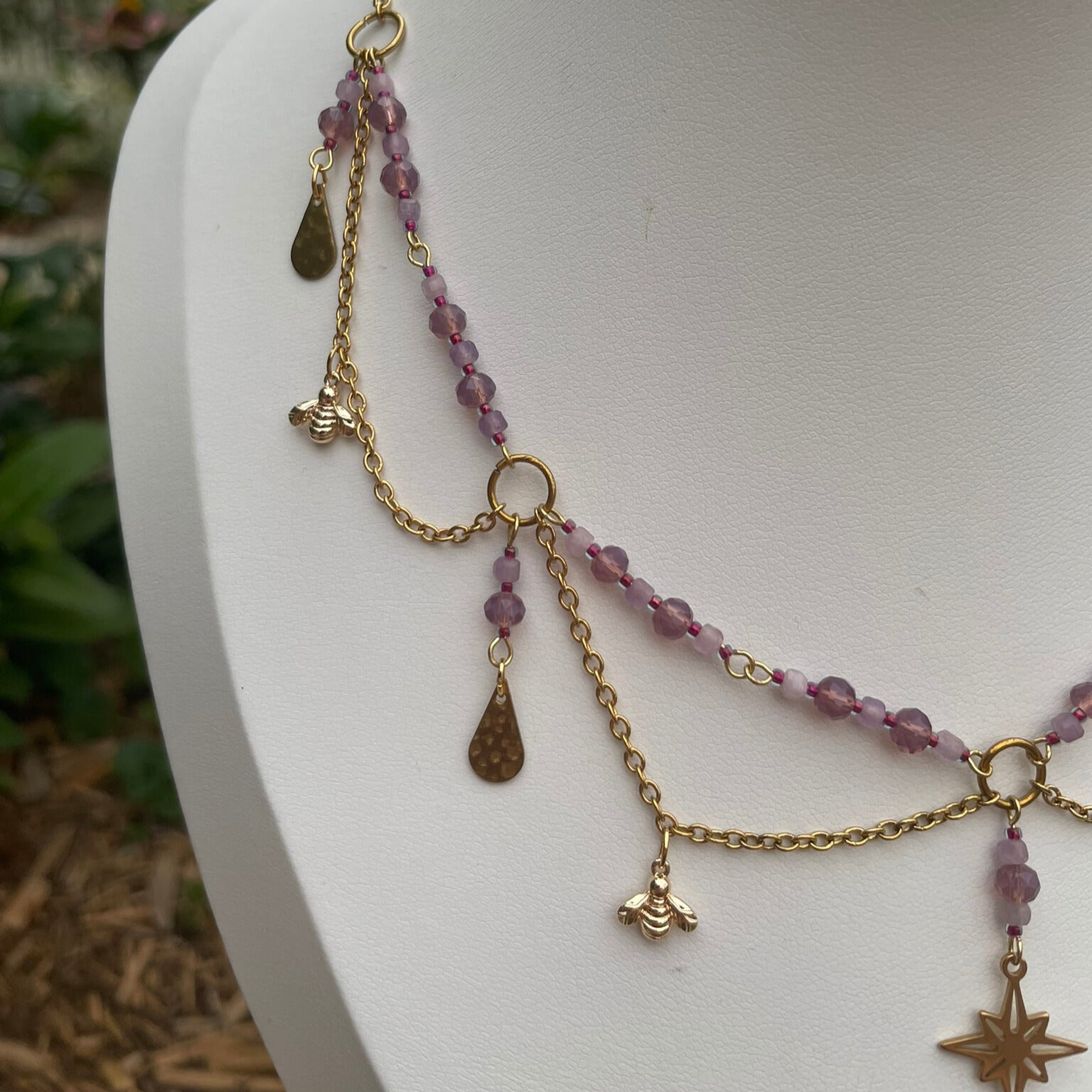 Pink and gold beaded bee charm necklace