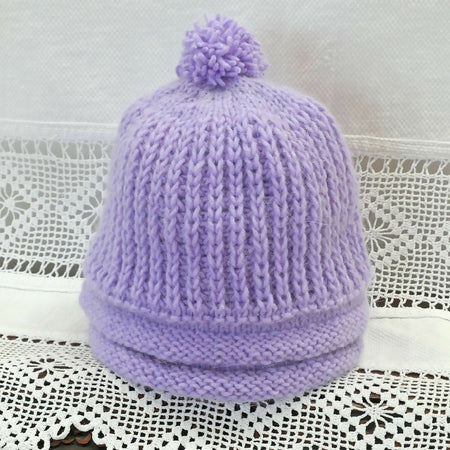 Angora / lambswool fisherman's rib beanies. Fit primary school child - adult.