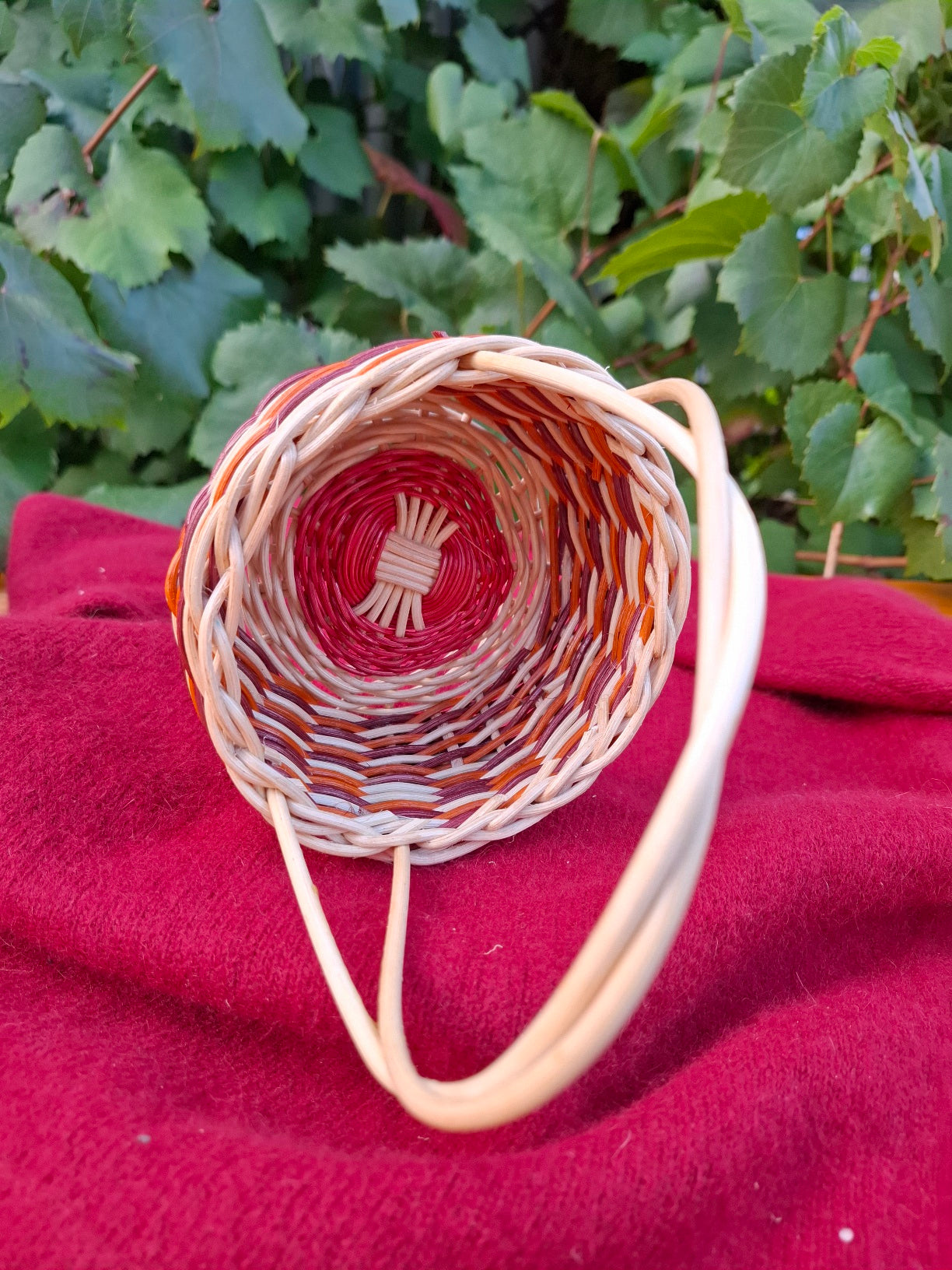 small orange brown handled basket