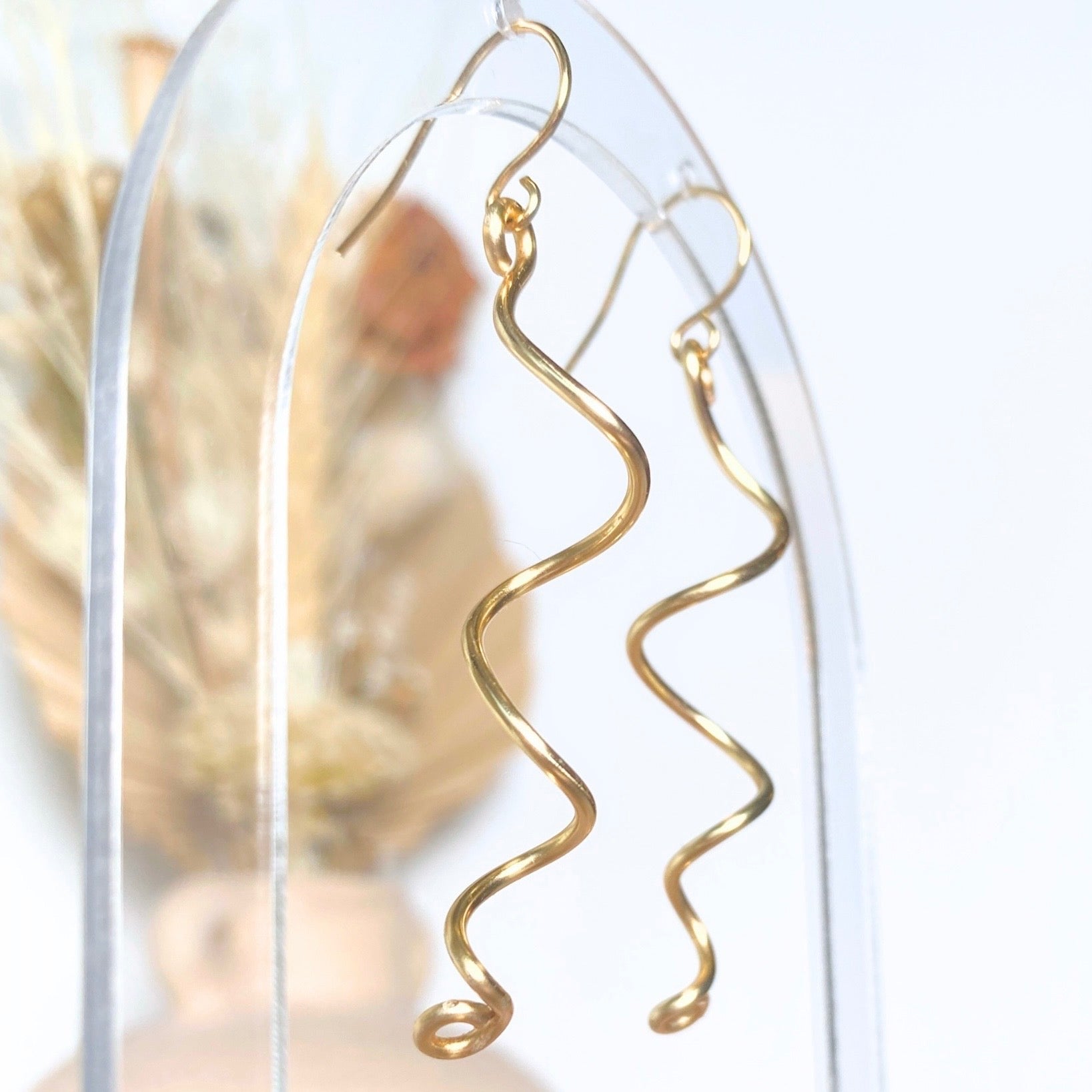 Gold spiralling dangle earrings | Silver-plated | Fun earrings