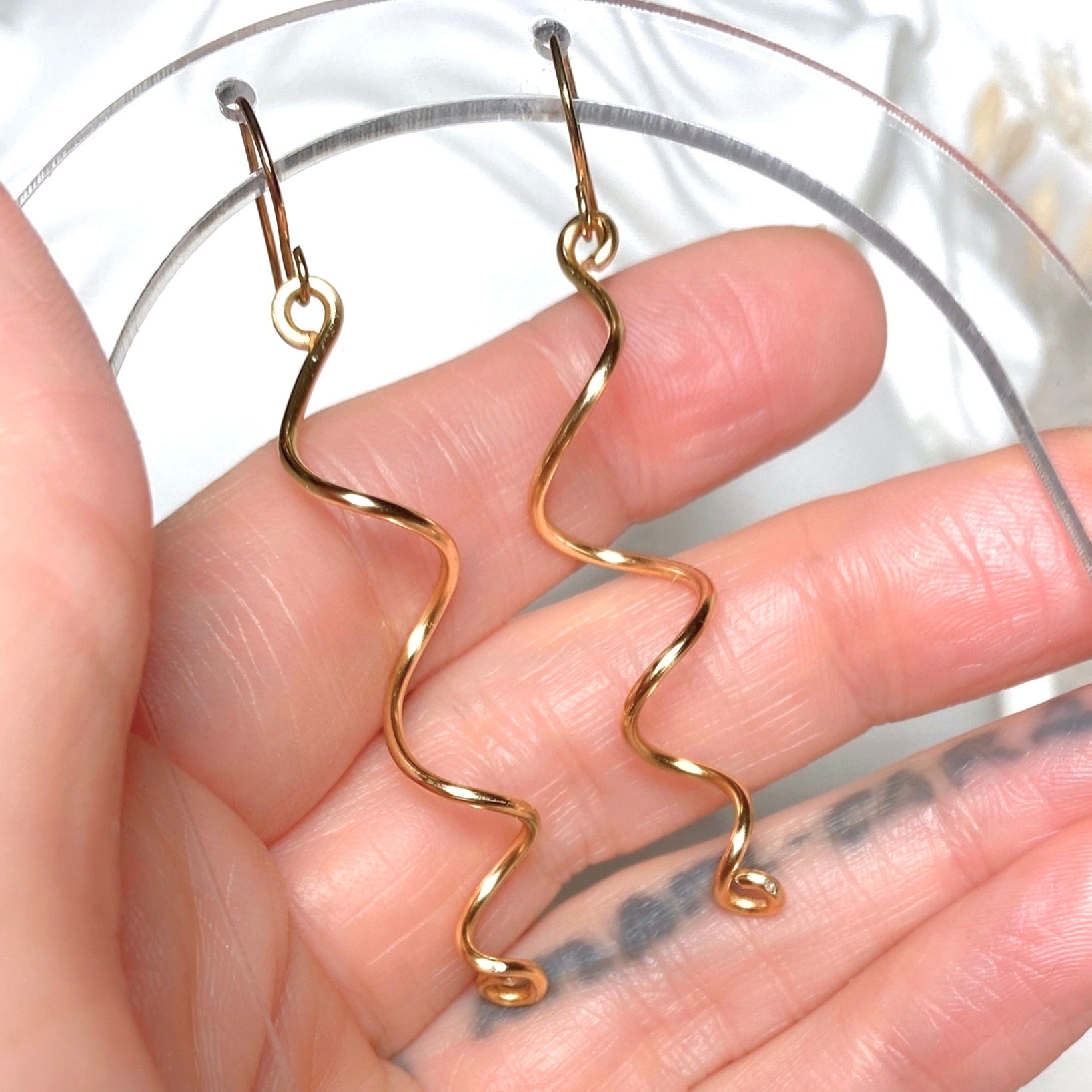 Gold spiralling dangle earrings | Silver-plated | Fun earrings