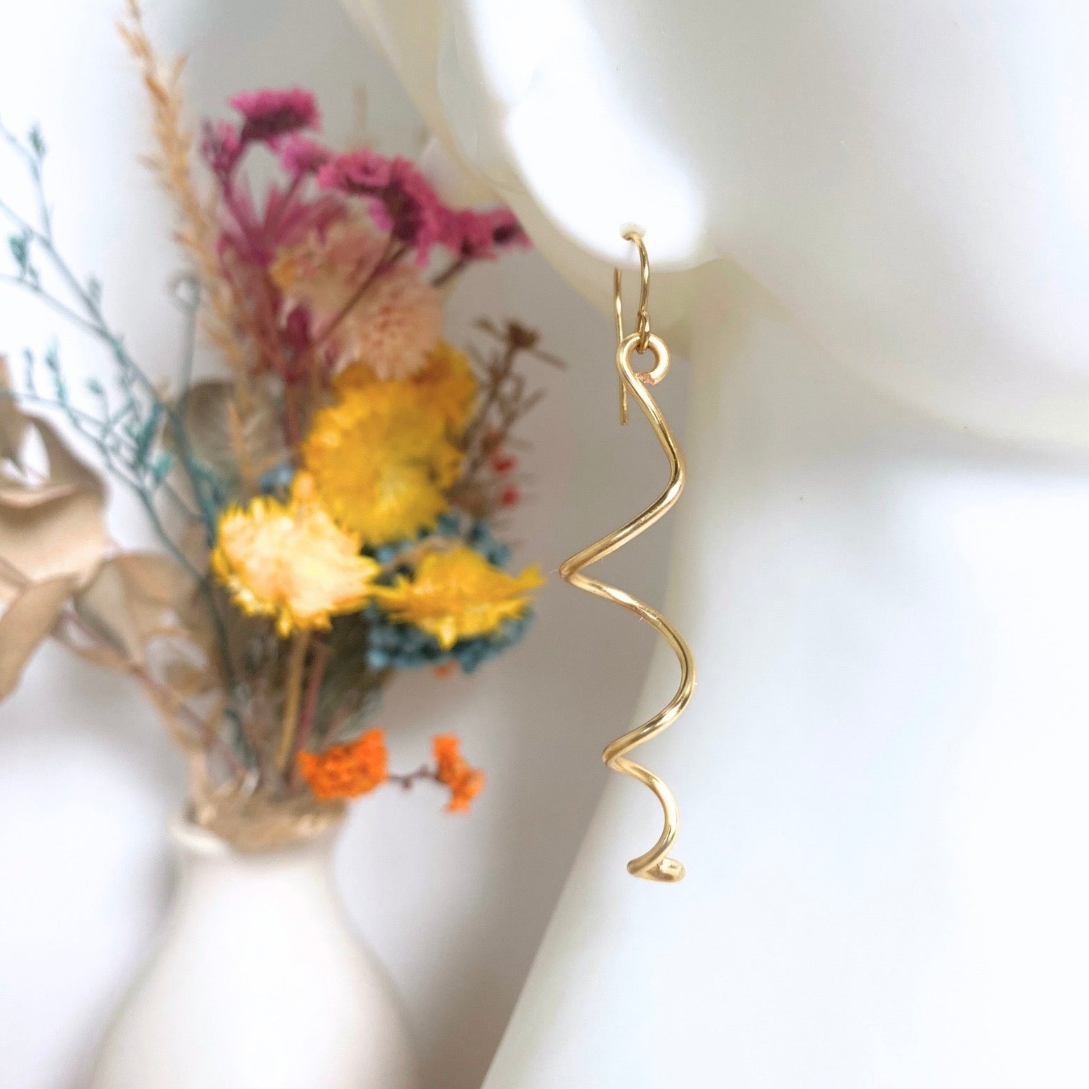 Gold spiralling dangle earrings | Silver-plated | Fun earrings
