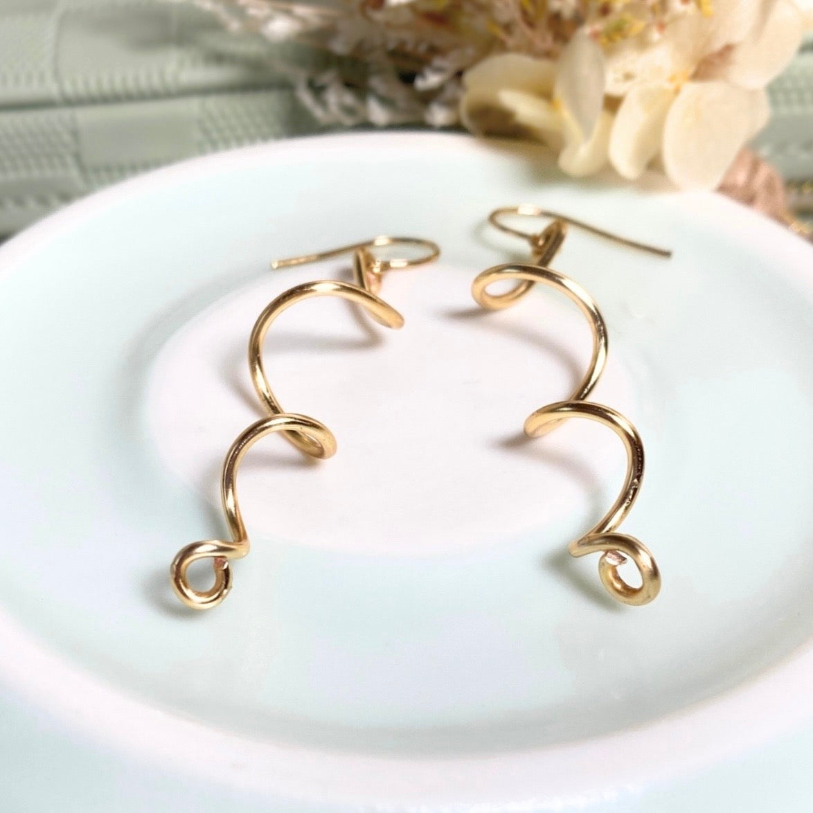 Gold spiralling dangle earrings | Silver-plated | Fun earrings