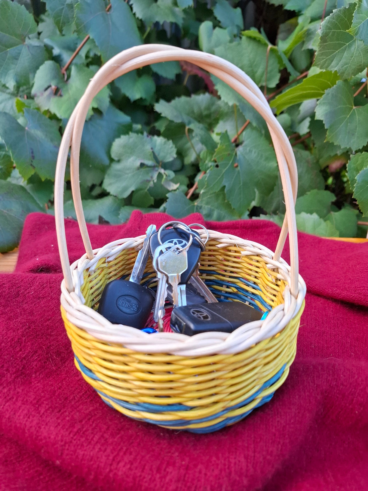 Small blue yellow handled basket