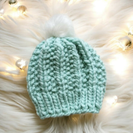 Super chunky hand knit merino wool mint beanie with faux fur pompom