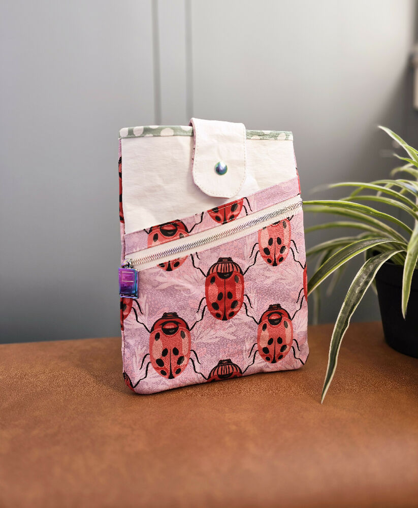 Book sleeve. Pink. Lady birds. Lady beetles.