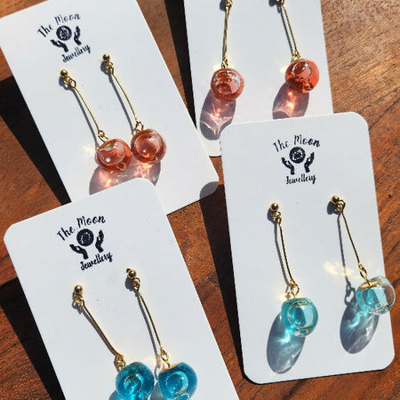 A drop of water, captured in a bead.