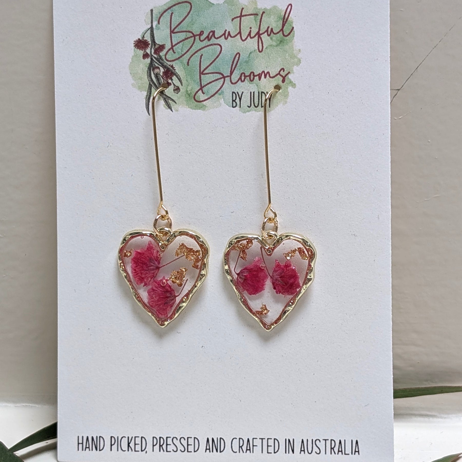 Elegant, heart shaped, magenta baby's breath earrings