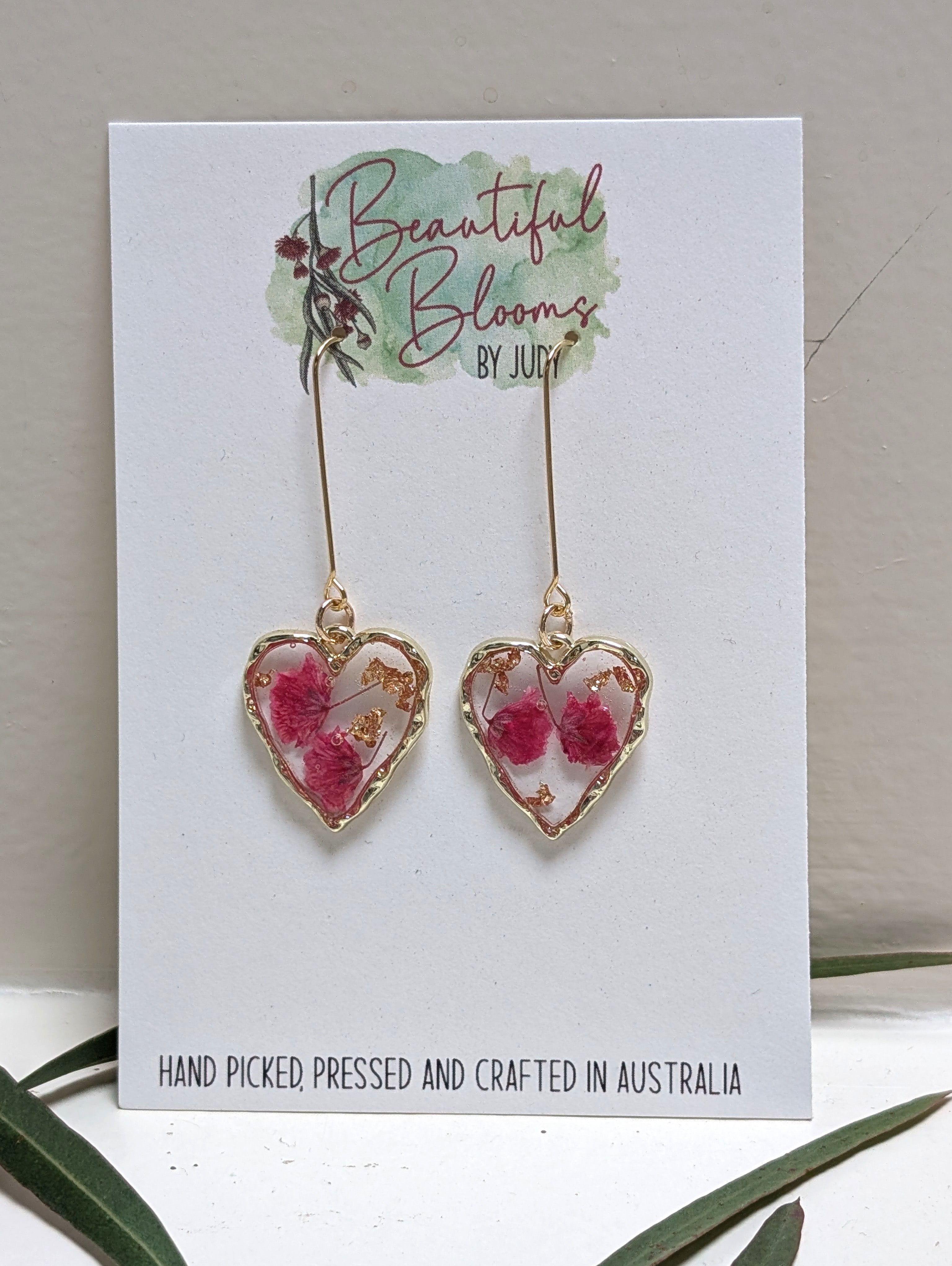 Elegant, heart shaped, magenta baby's breath earrings