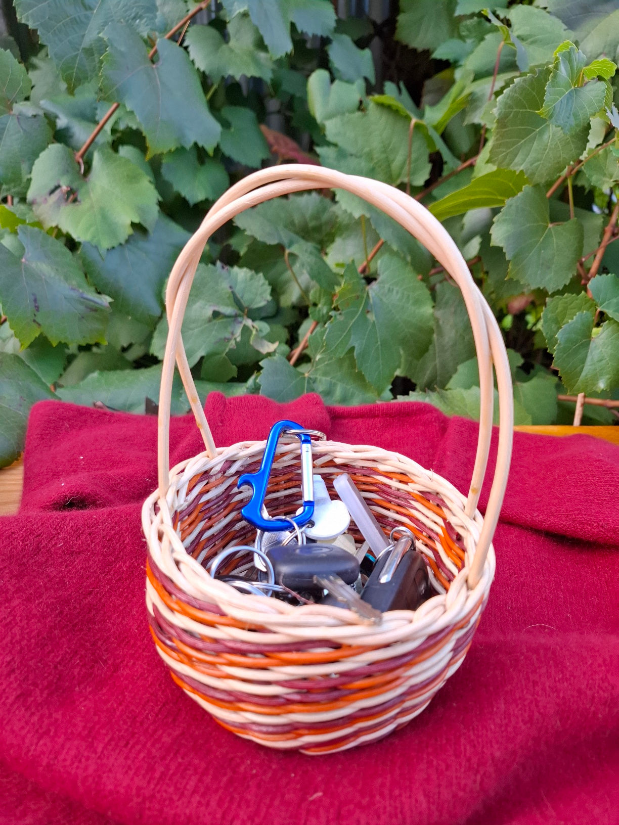 small orange brown handled basket