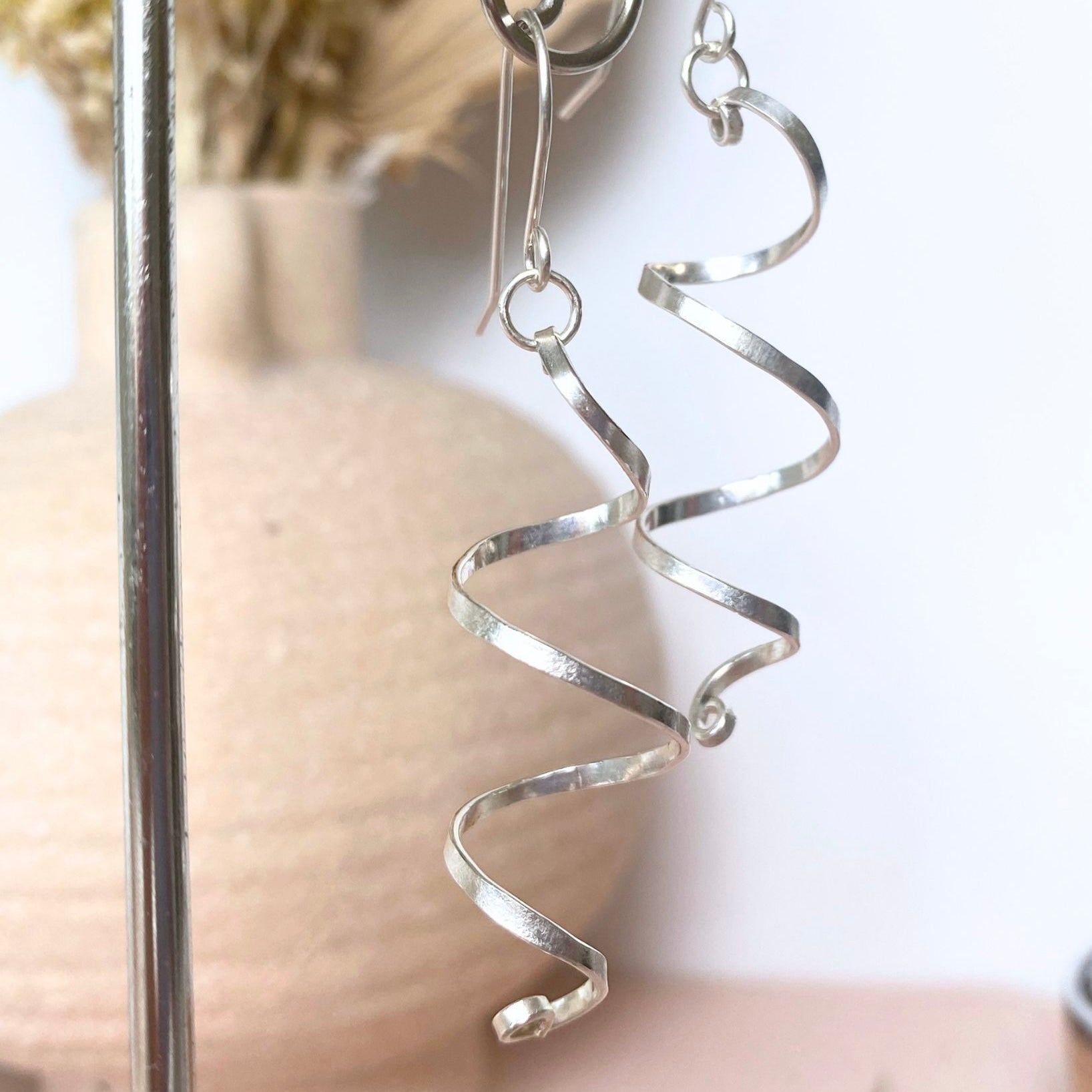 Long spiralling dangle earrings | Sterling silver | Wire jewellery