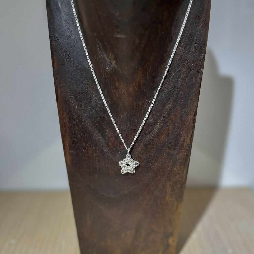 Silver filled star pendant display