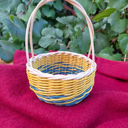 Small blue yellow handled basket