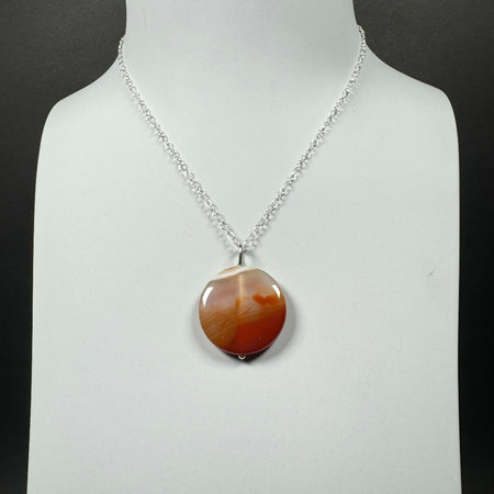 Carnelian disc on a sterling silver chain necklace
