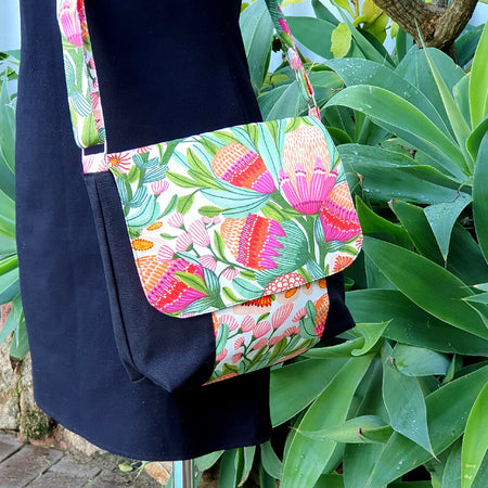 Spacious Cross Body Bag with two pockets in colourful wildflower fabric