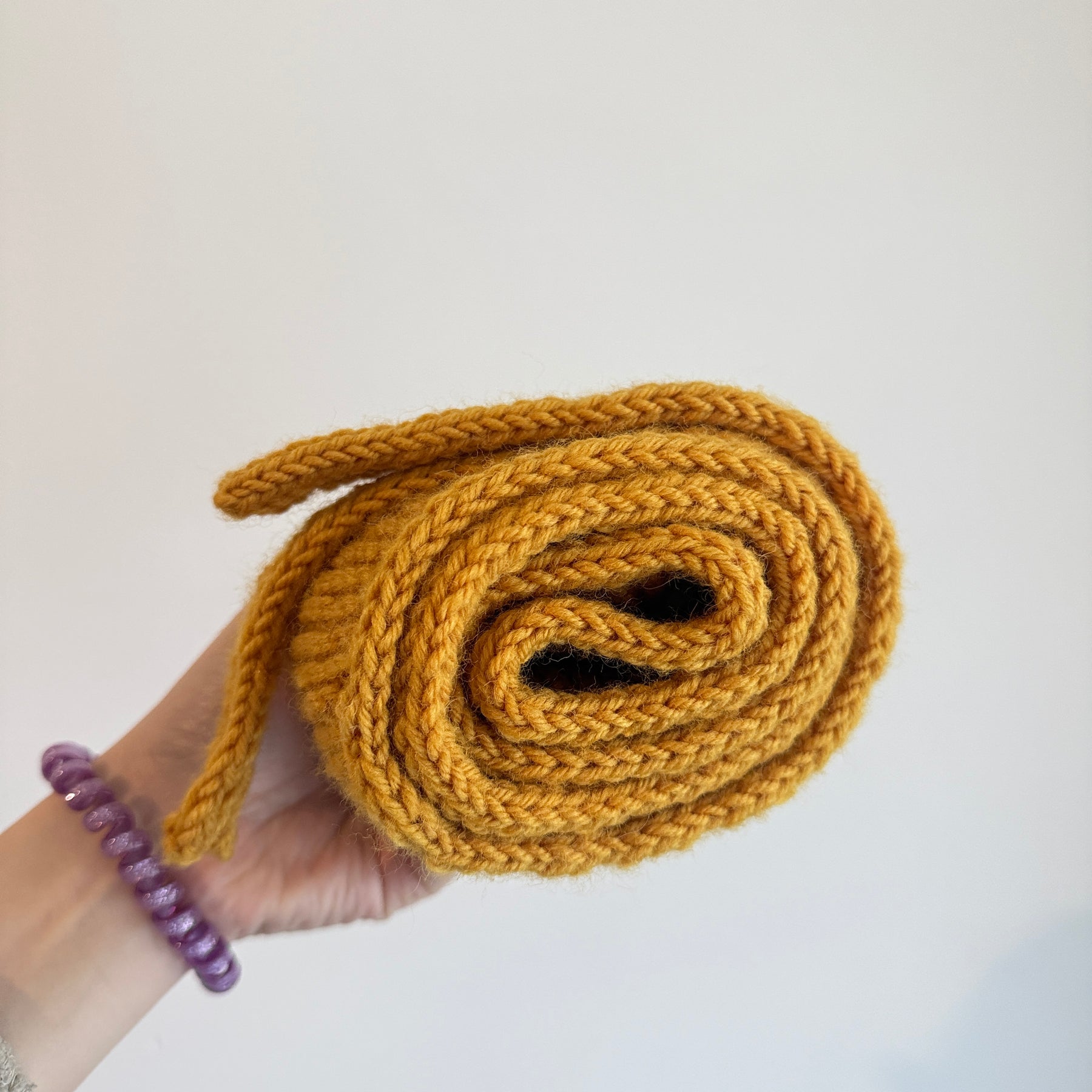 Knitted sophie scarf in mustard yellow