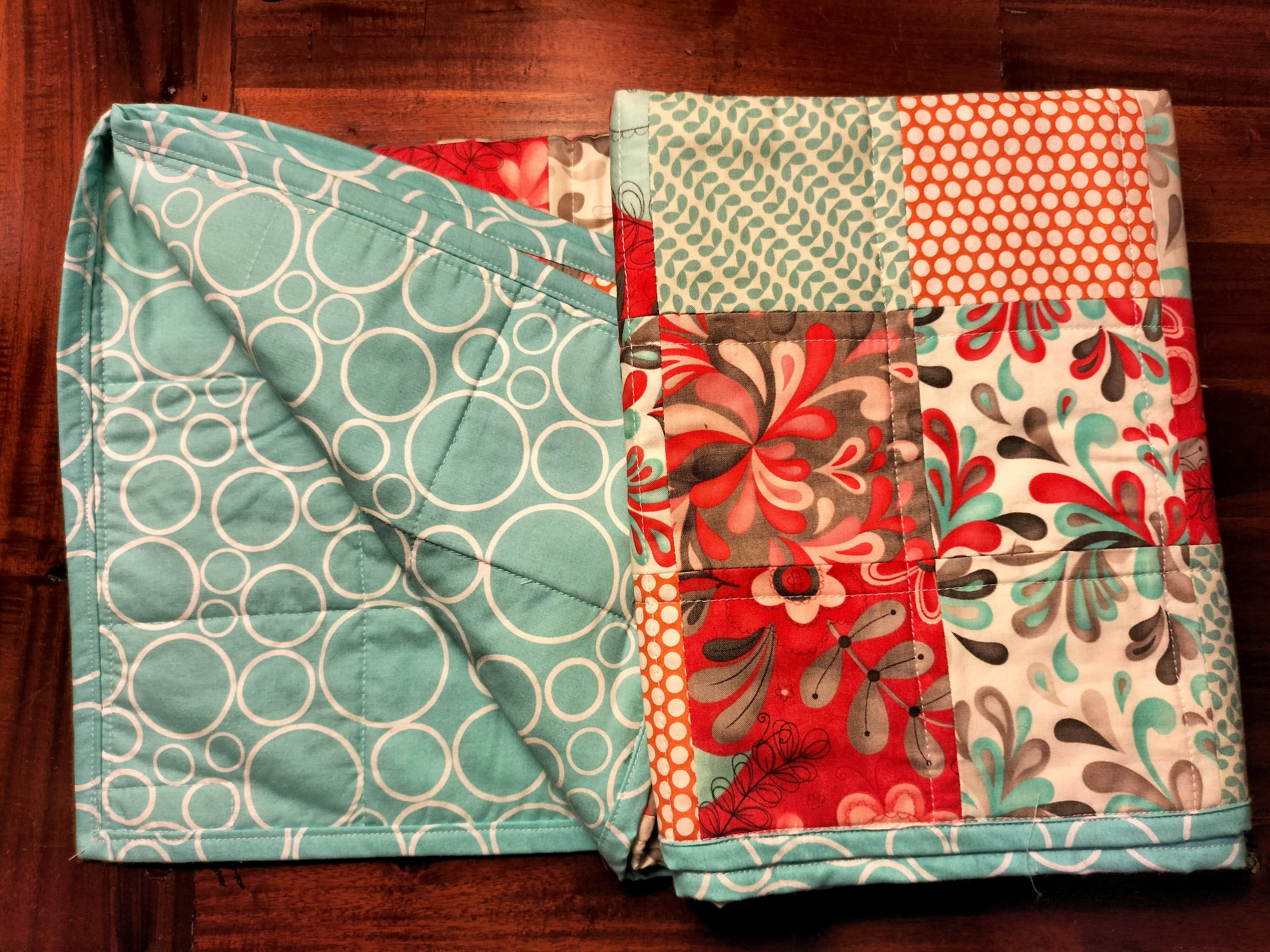 Birds & Blooms Patchwork Baby Quilt