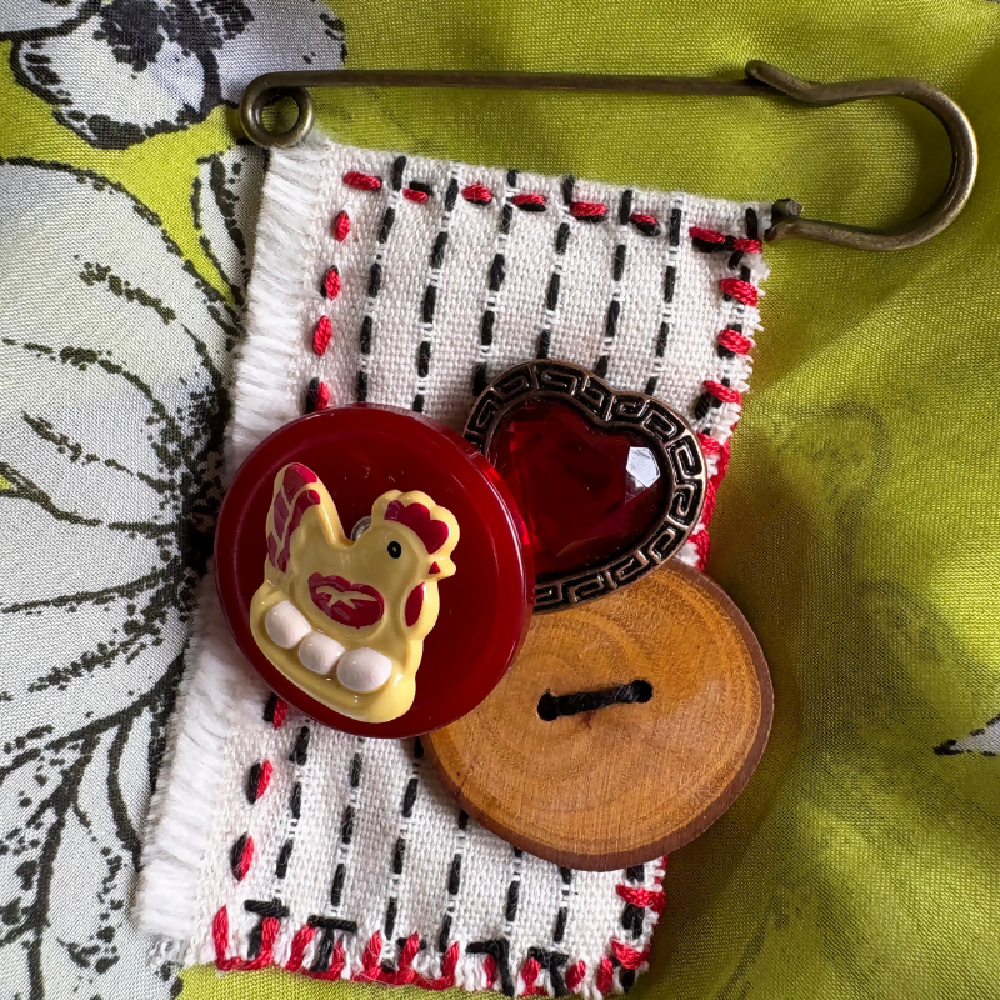 Hand stitched chicken bead brooch by Leumesin Handmade