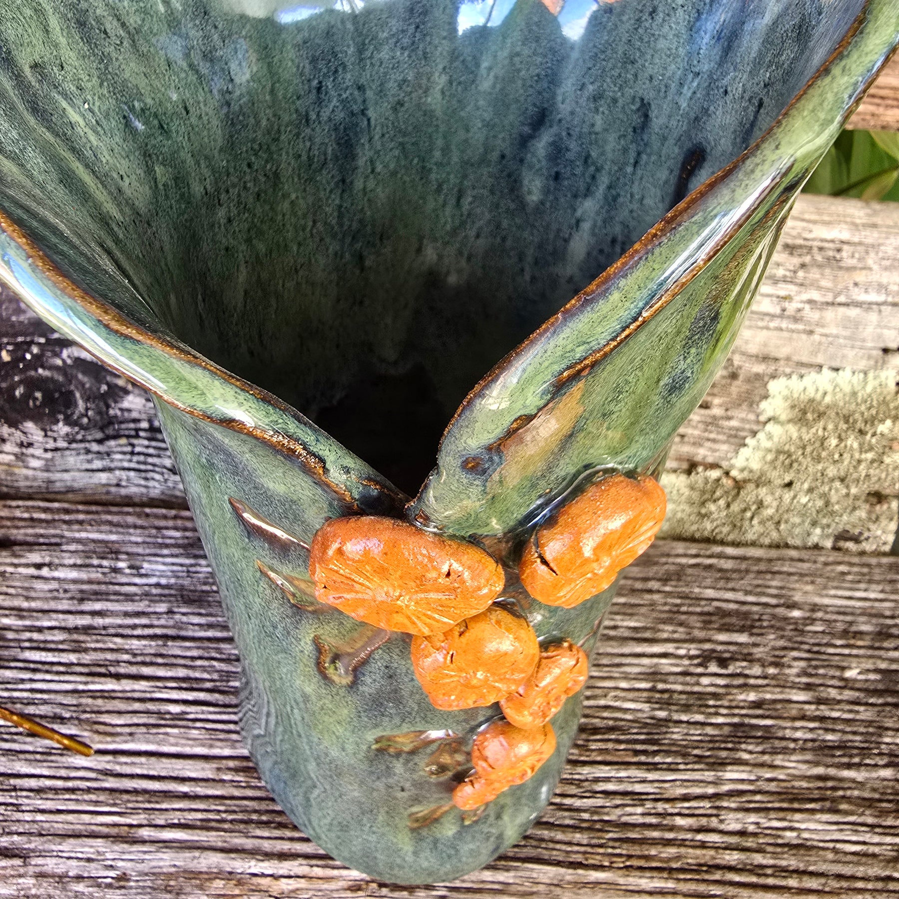 Iridescent green vase